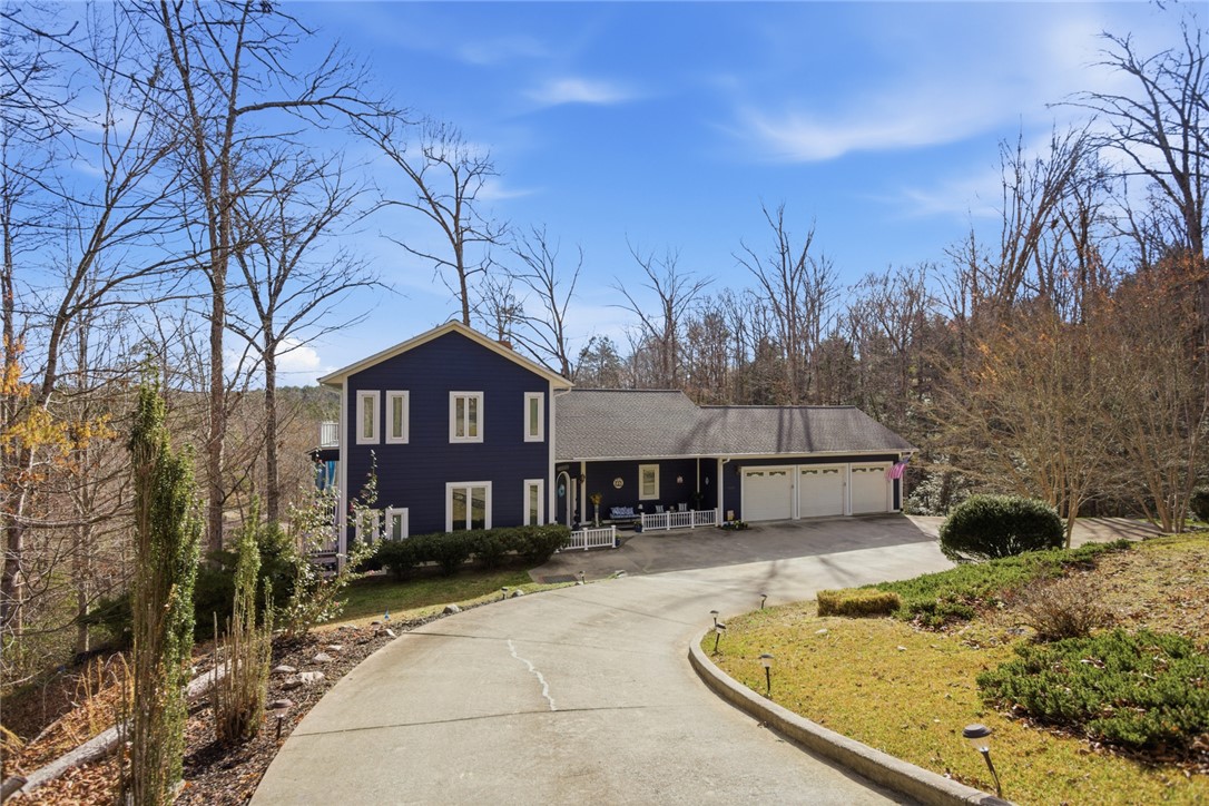 320 Holly Lane Walhalla, SC 29691 - Photo 11 of 41 This charming home offers ample parking and lush surroundings, perfect for serene living.