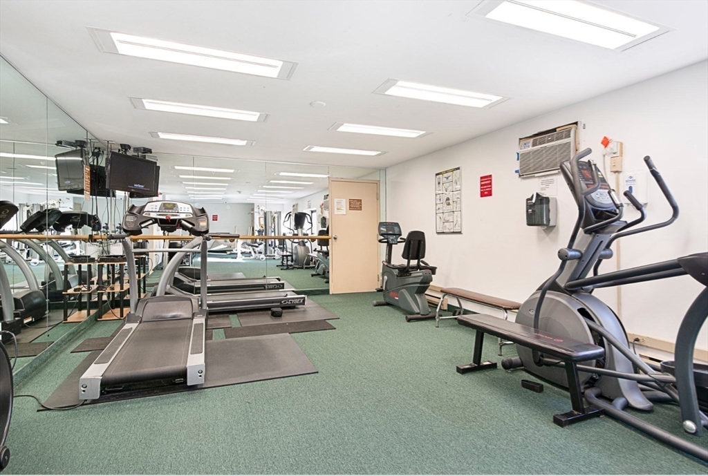 1325 Worcester Road, Unit A11 Framingham, MA 01701 - Photo 14 of 18 a view of a room with gym equipment