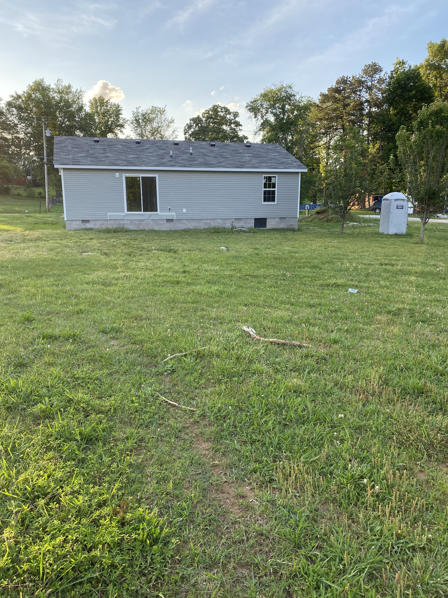 114 Shelton Road Manchester, TN 37355 - Photo 6 of 6 a front view of a house with a yard