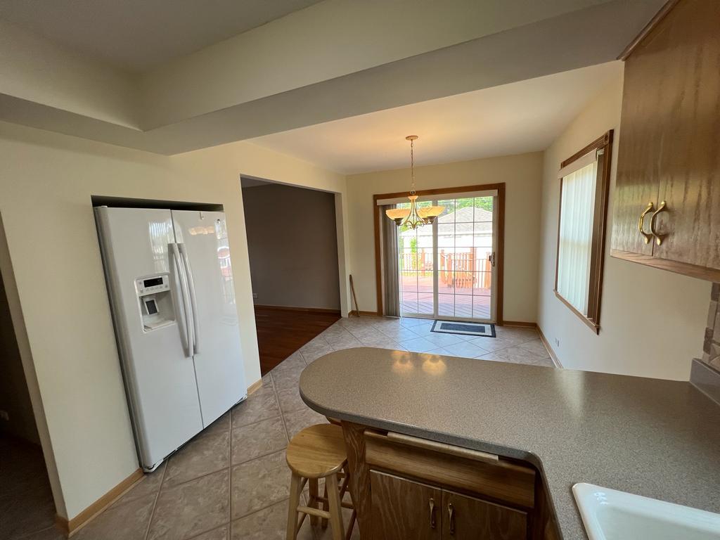 4031 Custer Avenue Lyons, IL 60534 - Photo 11 of 38 a room with furniture and window