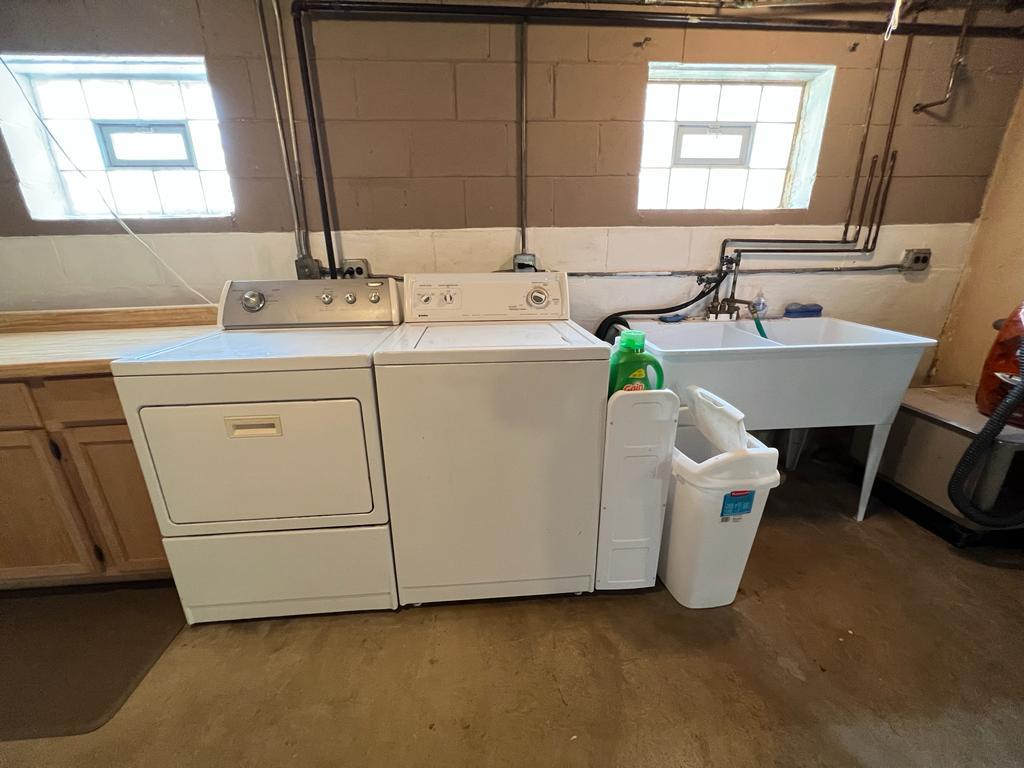 4031 Custer Avenue Lyons, IL 60534 - Photo 29 of 38 a bathroom with a sink and a mirror