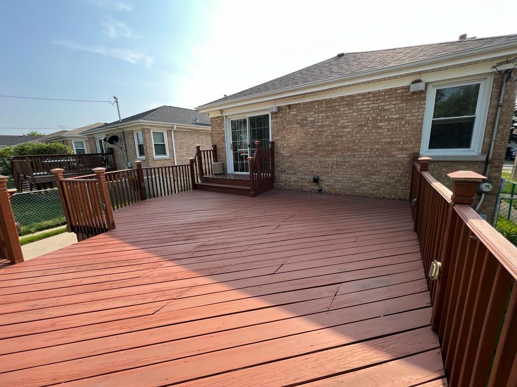 4031 Custer Avenue Lyons, IL 60534 - Photo 33 of 38 a view of a house with wooden deck