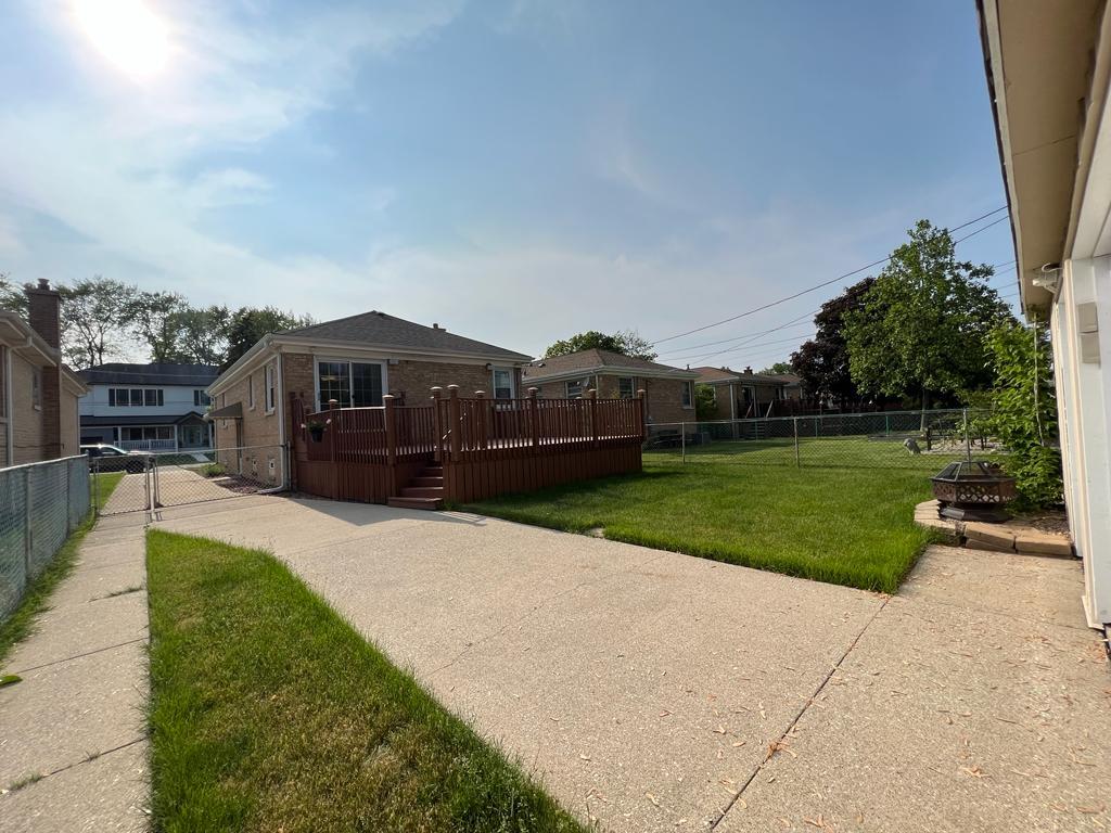 4031 Custer Avenue Lyons, IL 60534 - Photo 36 of 38 a view of a house with entertaining space