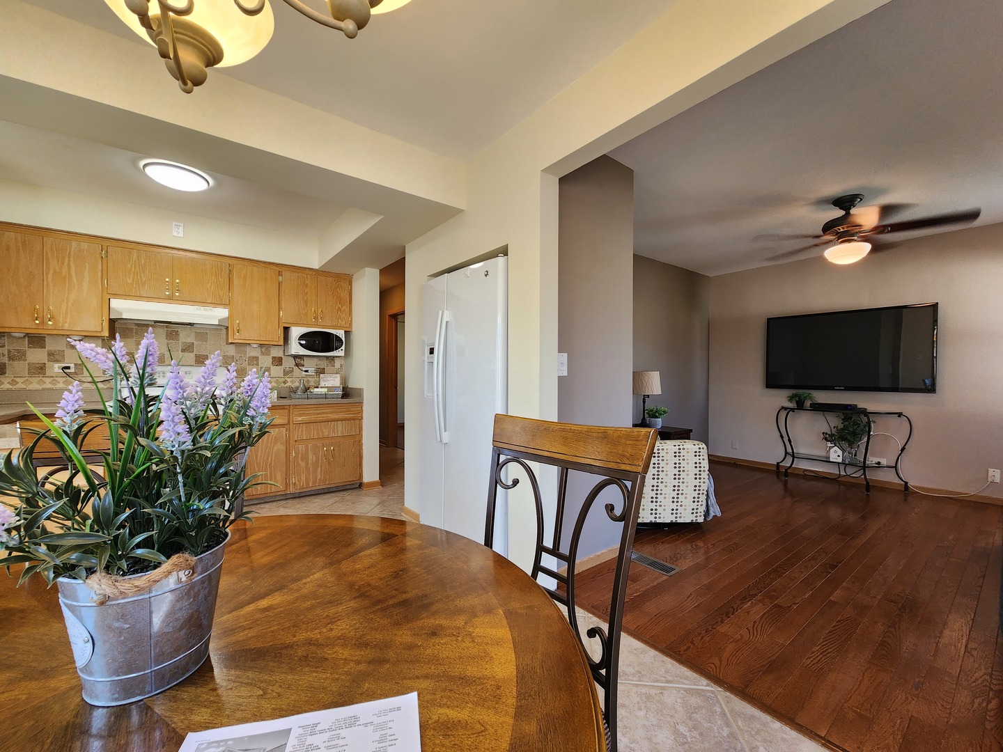 4031 Custer Avenue Lyons, IL 60534 - Photo 8 of 38 a living room with furniture and a flat screen tv