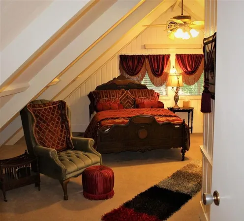 a bedroom with a bed and closet