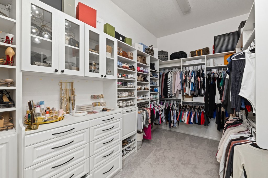 8801 Wild Rice Cove Austin, TX 78738 - Photo 23 of 40 The custom walk-in closet of your dreams!