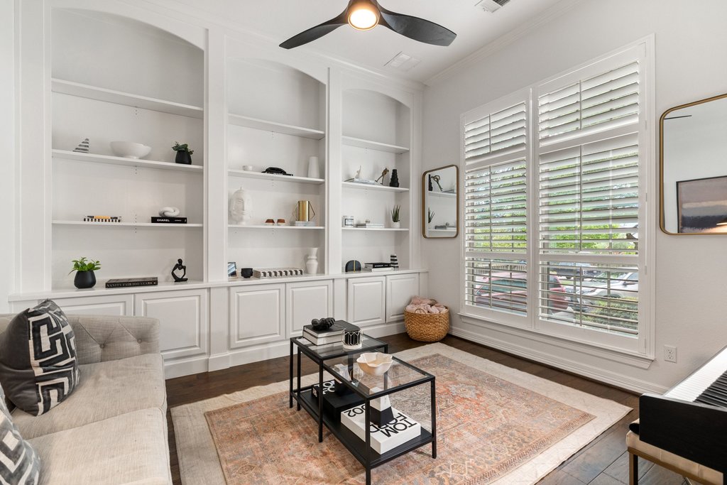 8801 Wild Rice Cove Austin, TX 78738 - Photo 24 of 40 French doors off the entry foyer open into this gorgeous home office with sophisticated built-ins and front yard views.