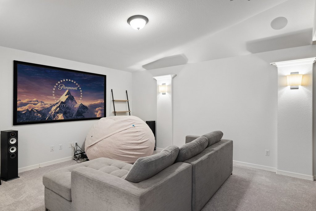8801 Wild Rice Cove Austin, TX 78738 - Photo 28 of 40 Take your movie nights to the next level with this dedicated media room.