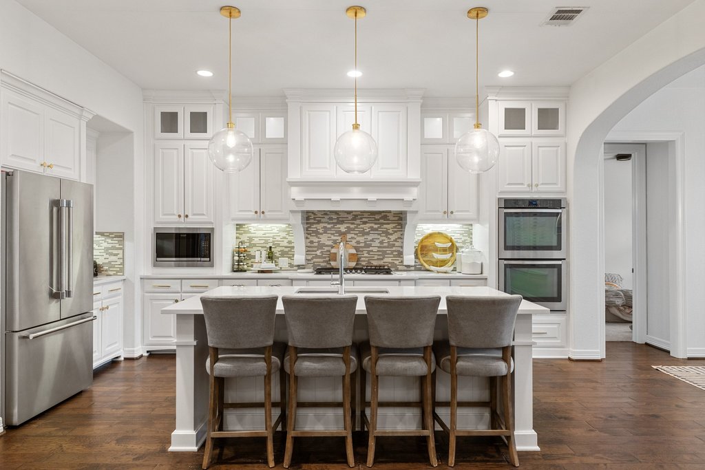 8801 Wild Rice Cove Austin, TX 78738 - Photo 3 of 40 The interior shines with refined modern finishes and a stunning gourmet kitchen.