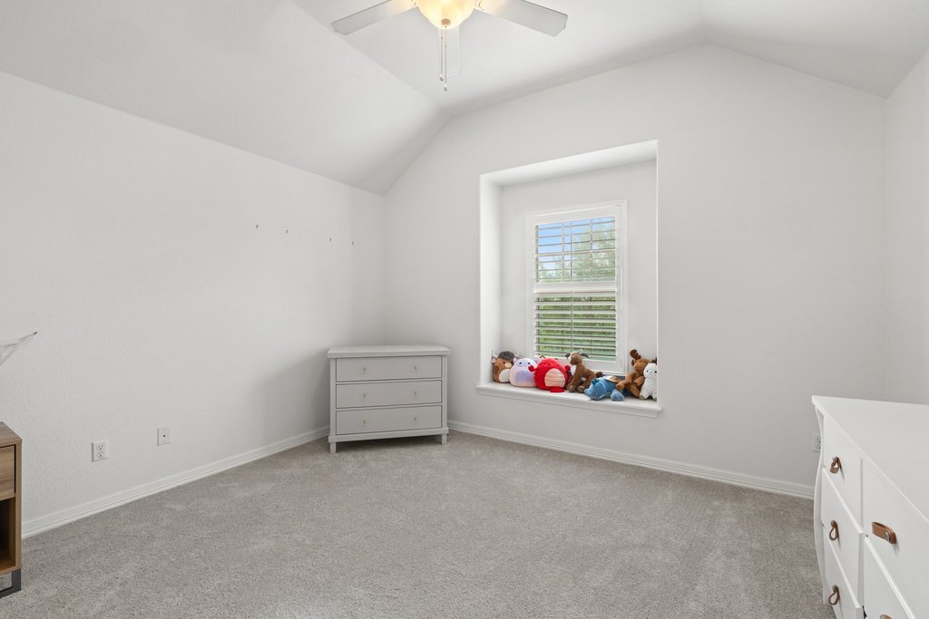 8801 Wild Rice Cove Austin, TX 78738 - Photo 31 of 40 The other secondary bedroom connected to the jack-n-jill bathroom.