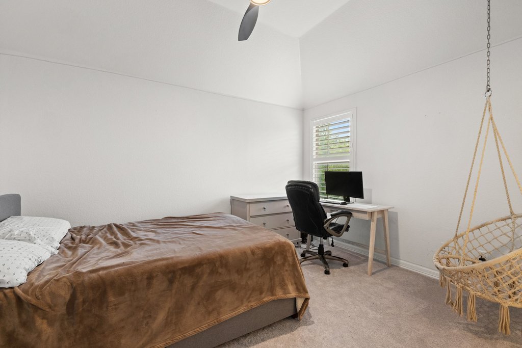 8801 Wild Rice Cove Austin, TX 78738 - Photo 32 of 40 With three bedrooms upstairs plus the main floor guest room, you have ample space for everyone.