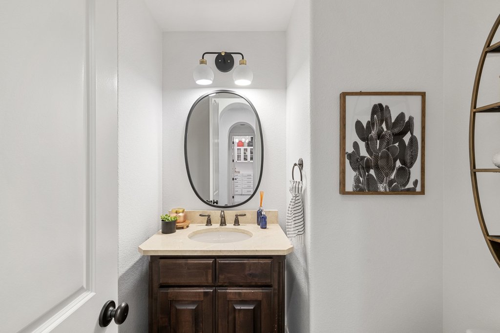 8801 Wild Rice Cove Austin, TX 78738 - Photo 34 of 40 There are also two guest powder rooms.