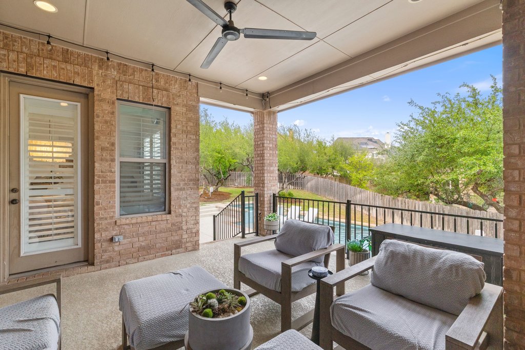 8801 Wild Rice Cove Austin, TX 78738 - Photo 36 of 40 Enjoy relaxing in the shade under the breeze of fan and taking in the peaceful views.
