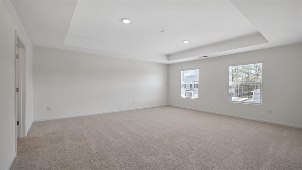 8580 Seabiscuit Road Lithonia, GA 30058 - Photo 14 of 37 an empty room with windows