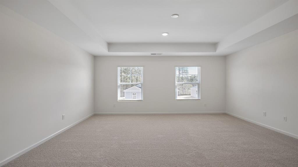 8580 Seabiscuit Road Lithonia, GA 30058 - Photo 15 of 37 an empty room with a window