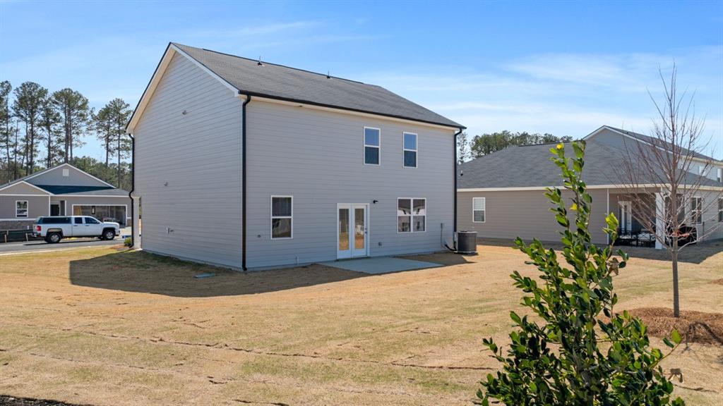 8580 Seabiscuit Road Lithonia, GA 30058 - Photo 35 of 37 a view of a house with backyard and sitting area