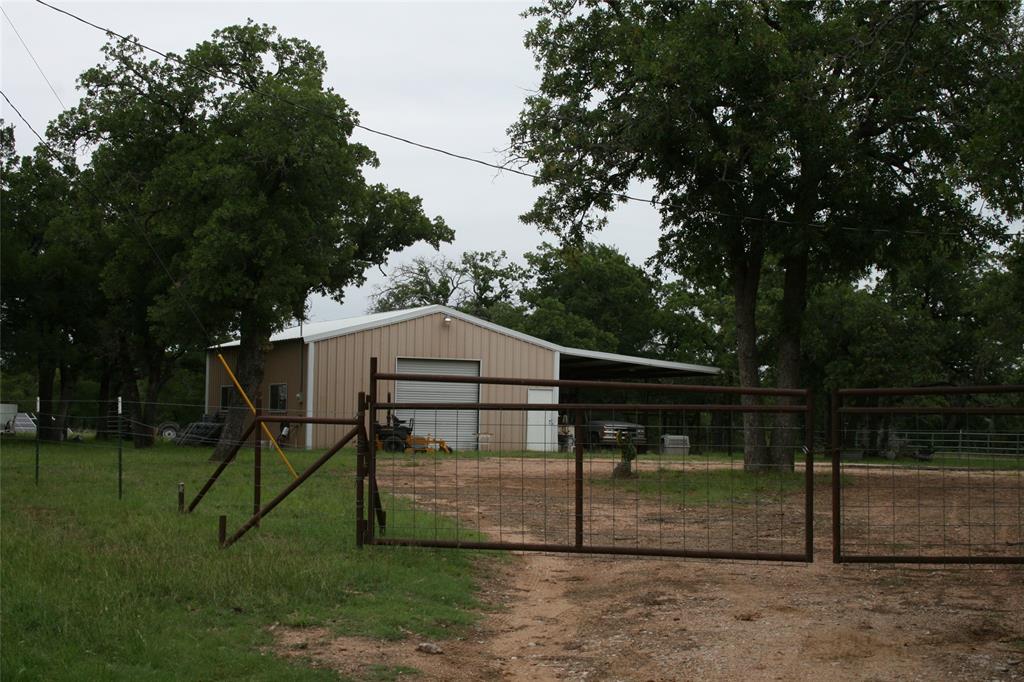 2701 Live Oak Road Santo, TX 76472 - Photo 4 of 39 Fence around home site