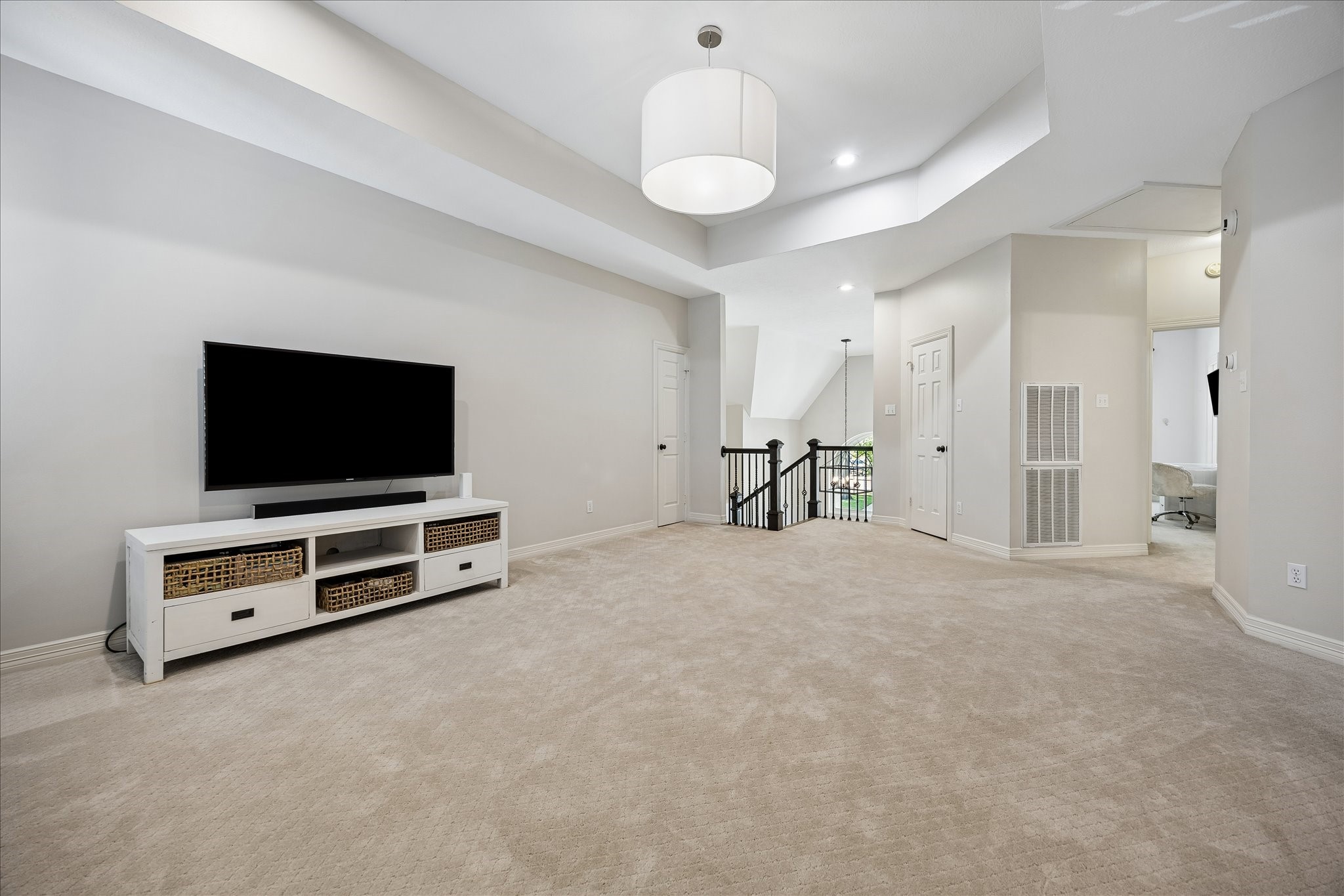 4131 Sunset Boulevard Houston, TX 77005 - Photo 23 of 38 a view of a livingroom with furniture and a flat screen tv