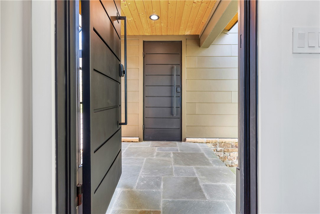 231 Keowee Turtle Head Road Salem, SC 29676 - Photo 22 of 50 Custom Steel Doors to Pet Area & Garage