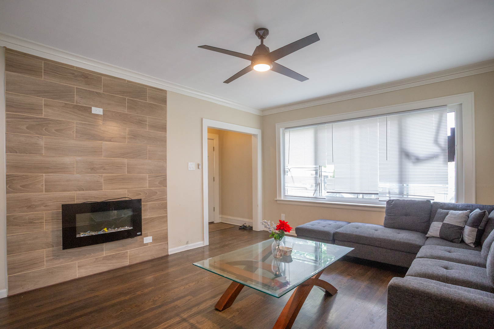 9226 South Ellis Avenue Chicago, IL 60619 - Photo 2 of 17 a living room with furniture and a fireplace