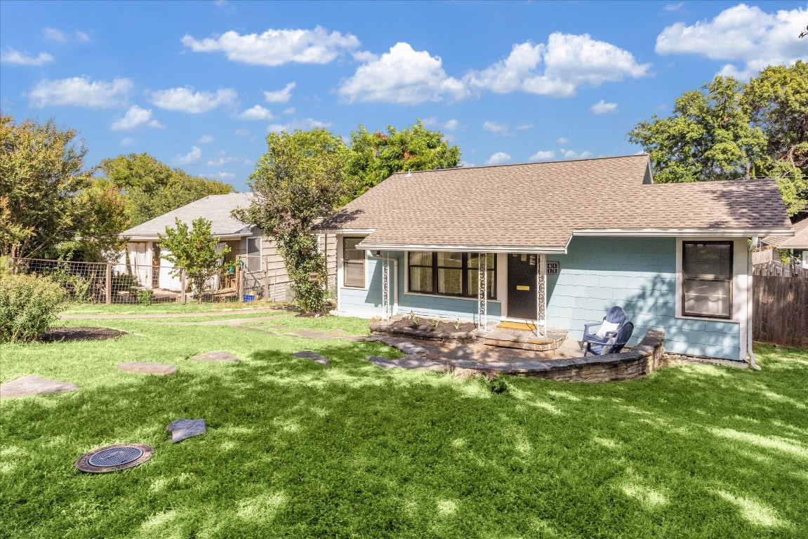 4111 Idlewild Road Austin, TX 78731 - Photo 1 of 1 a front view of house with yard and green space