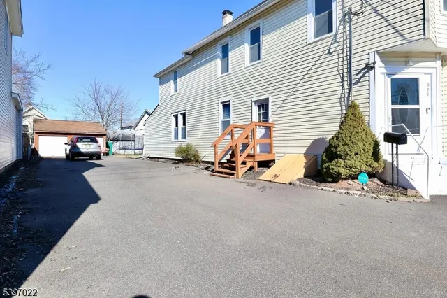 a view of a house with a street