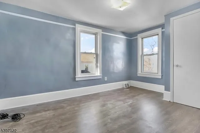 an empty room with windows