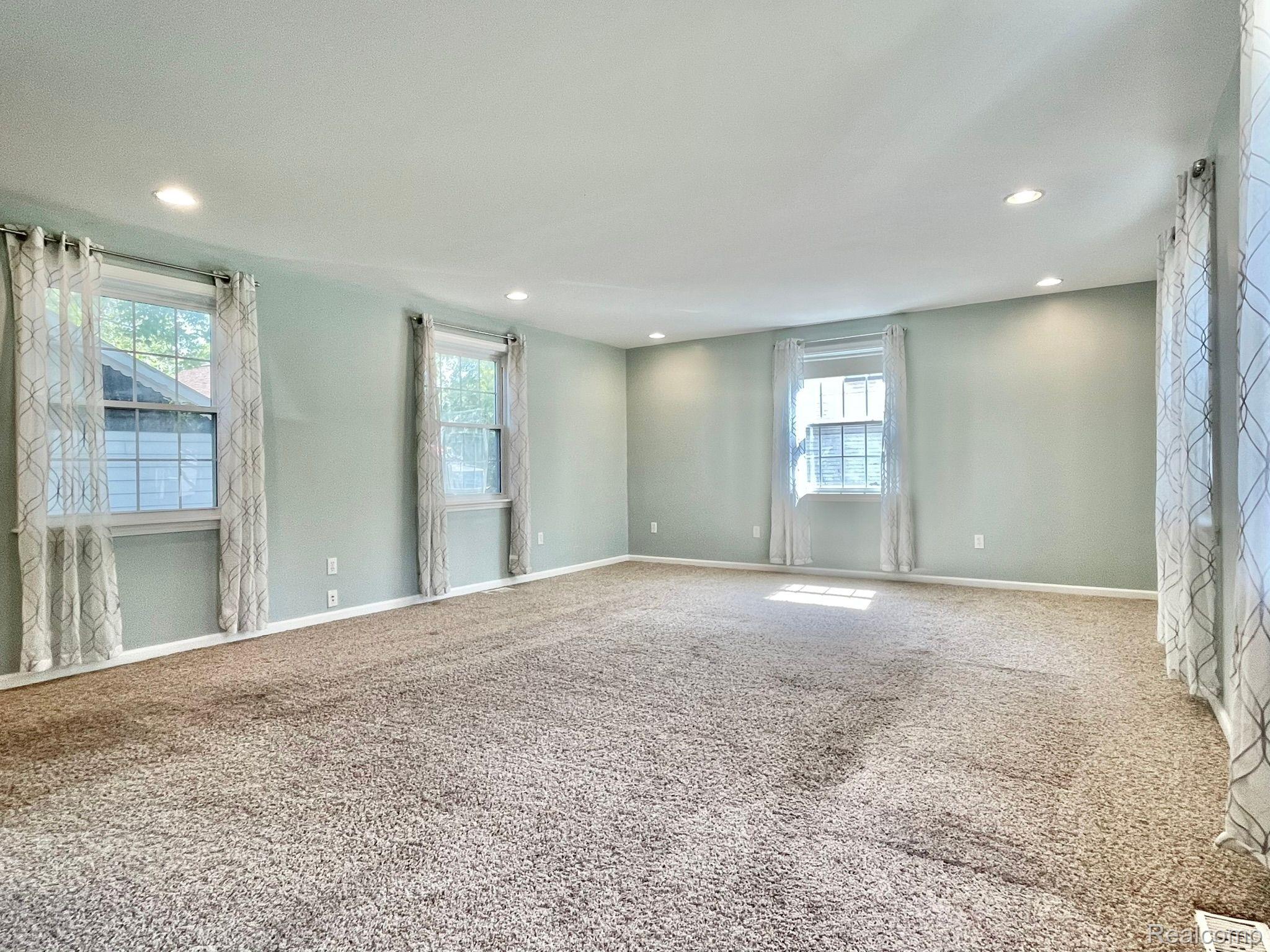 2807 Gravel Ridge Drive Rochester, MI 48307 - Photo 14 of 45 Living room is full of natural light
