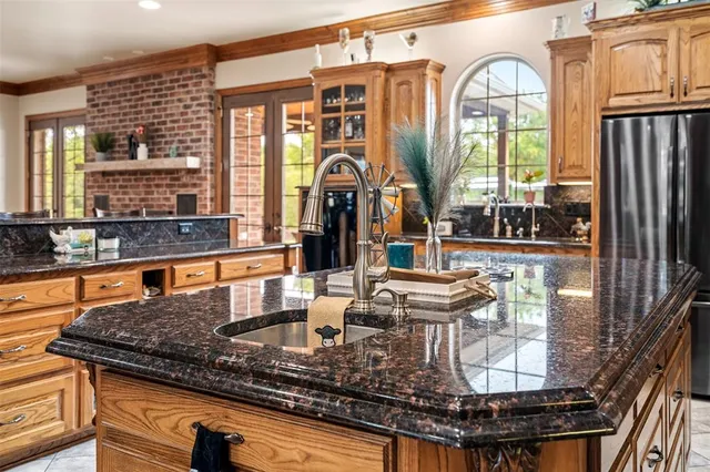 a kitchen with lots of counter top space and appliances