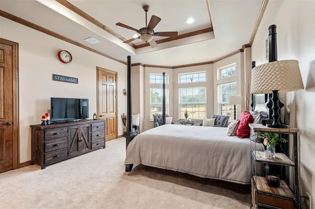 a bathroom with a sink double vanity granite and a mirror