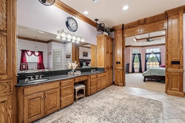 a kitchen with stainless steel appliances granite countertop a sink and cabinets