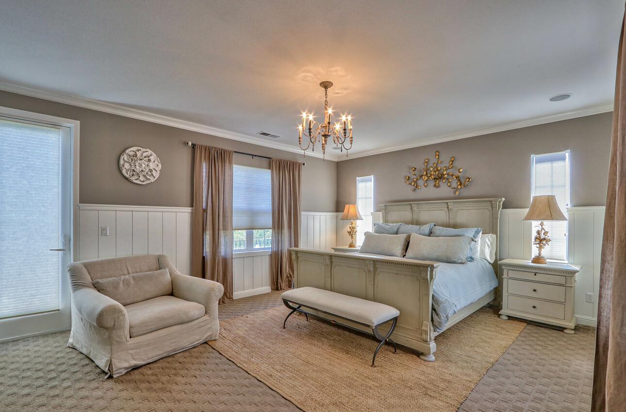 7260 Eagle Ridge Drive Gilroy, CA 95020 - Photo 21 of 36 a living room with furniture and a chandelier