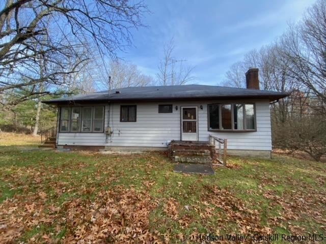 342 Awosting Road Pine Bush, NY 12566 - Photo 1 of 21 a front view of a house with garden