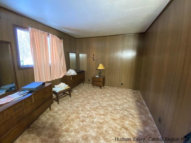 342 Awosting Road Pine Bush, NY 12566 - Photo 13 of 21 a bedroom with a bed and large windows