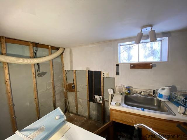 342 Awosting Road Pine Bush, NY 12566 - Photo 19 of 21 a bathroom with a sink a toilet and shower