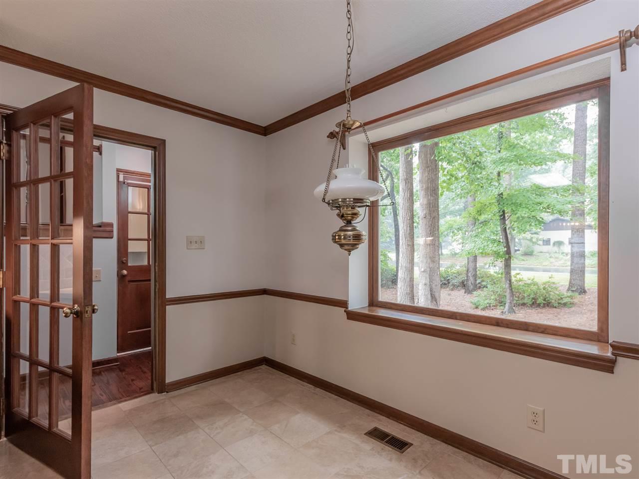 8701 Brandon Station Road Raleigh, NC 27613 - Photo 11 of 30 Enjoy morning coffee looking out this beautiful picture window.