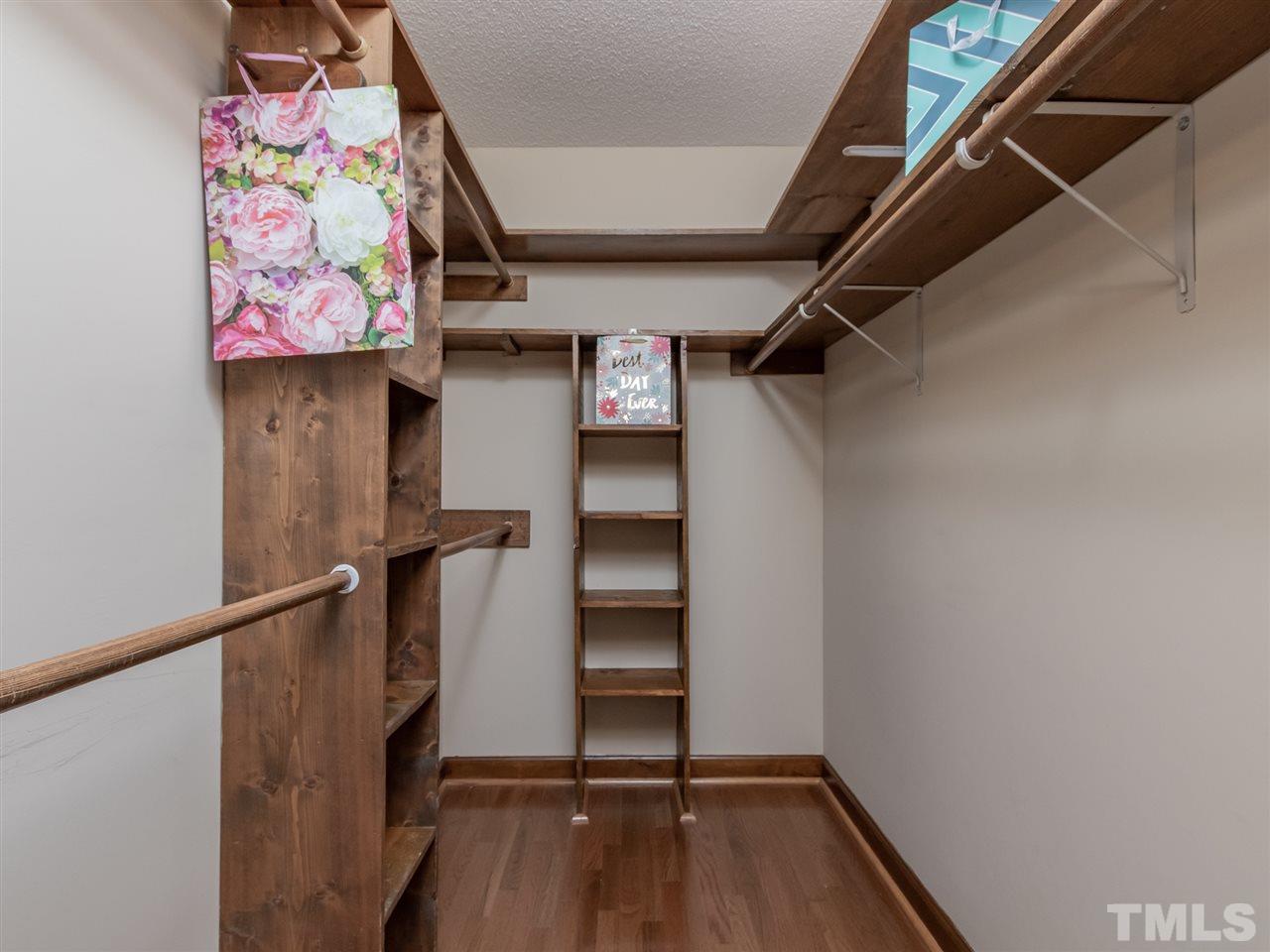 8701 Brandon Station Road Raleigh, NC 27613 - Photo 14 of 30 Closet with well thought out design for ideal storage.