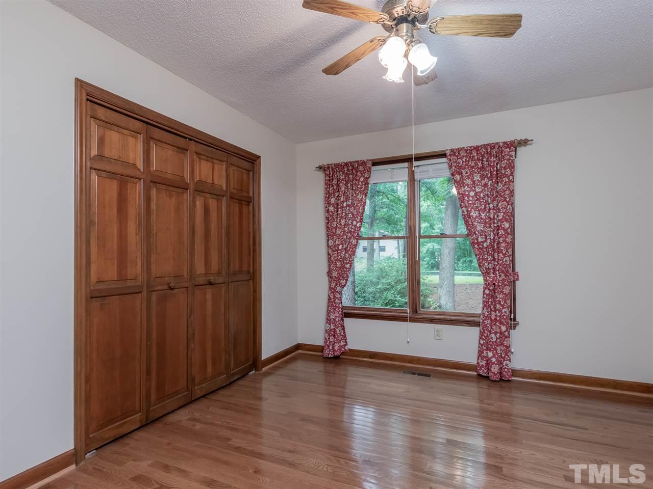 8701 Brandon Station Road Raleigh, NC 27613 - Photo 19 of 30 Each bedroom provides nice sized rooms and closet storage.