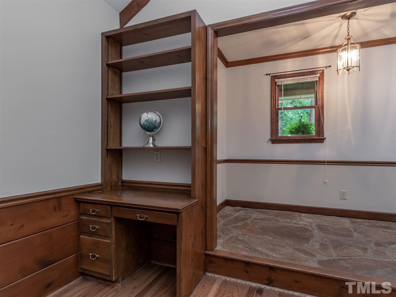 8701 Brandon Station Road Raleigh, NC 27613 - Photo 5 of 30 Plenty of space and storage for getting work projects completed.