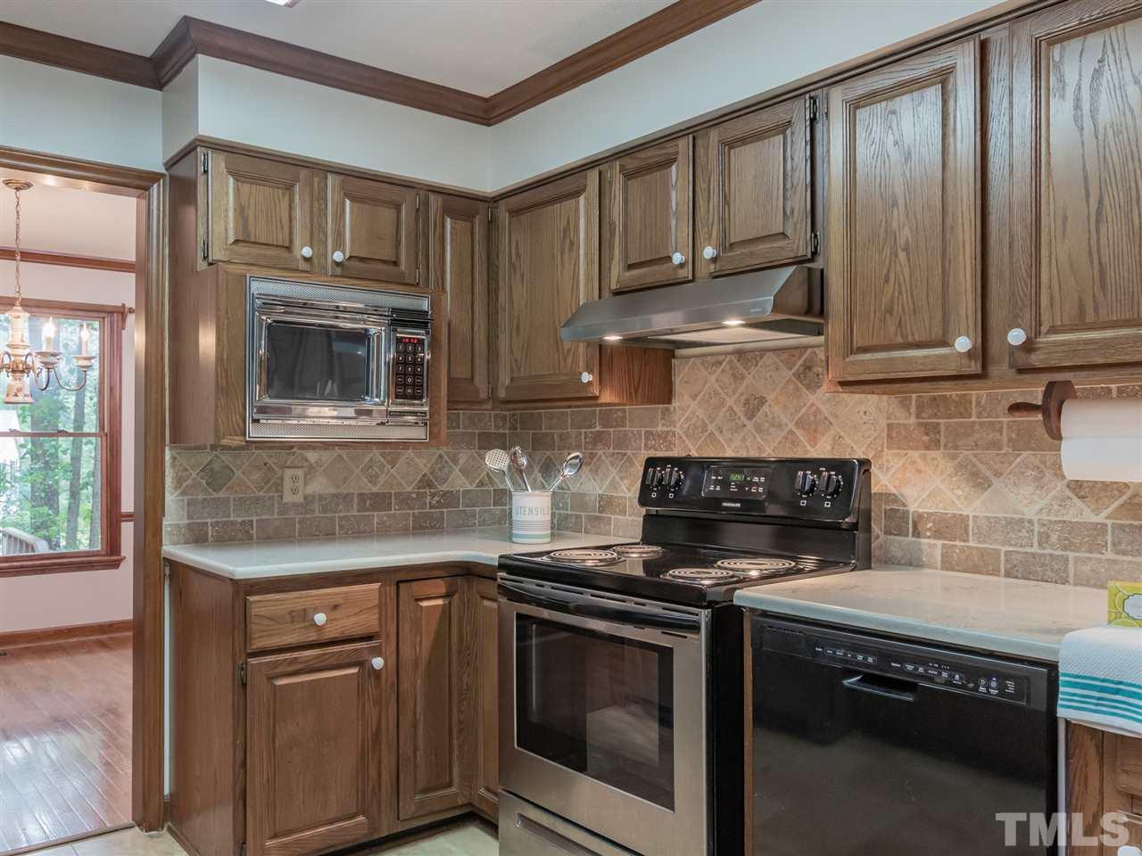 8701 Brandon Station Road Raleigh, NC 27613 - Photo 9 of 30 Newly added stainless steel appliances.
