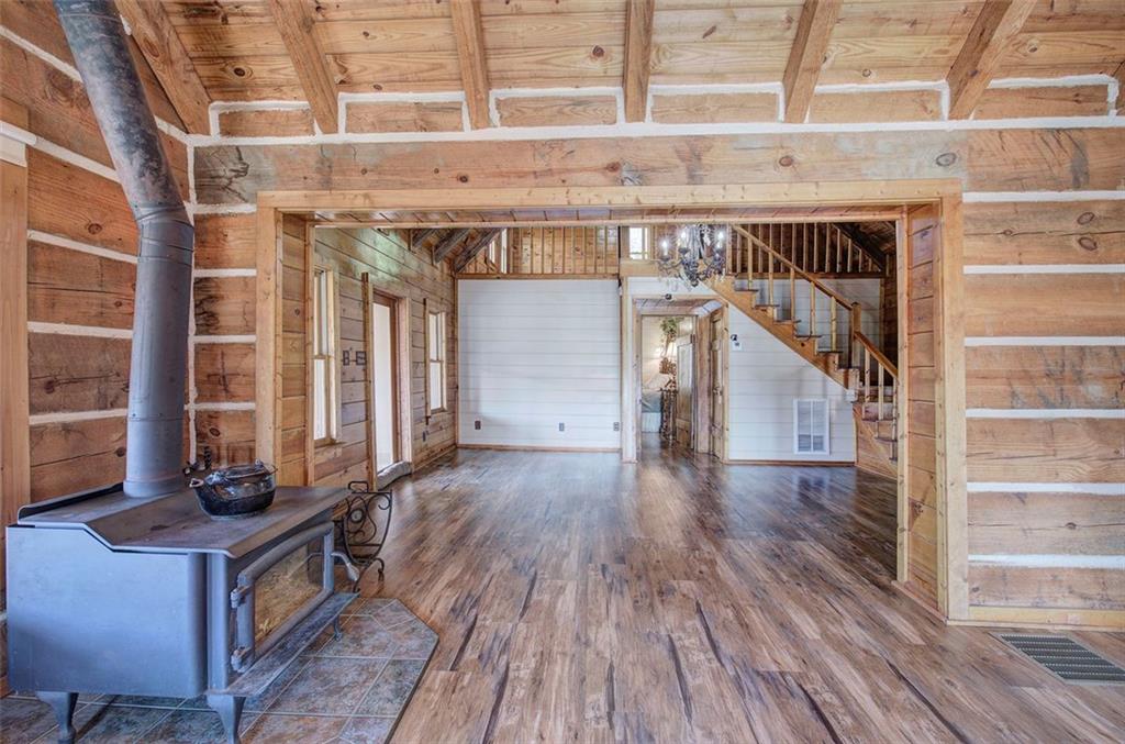 1252 Paris Mountain Road Rockmart, GA 30153 - Photo 28 of 93 a view of entryway with a wooden floor and windows