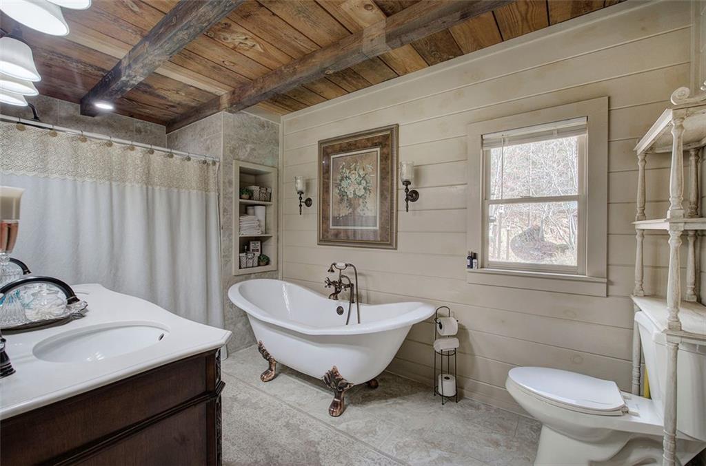 1252 Paris Mountain Road Rockmart, GA 30153 - Photo 32 of 93 a bathroom with a sink and a toilet