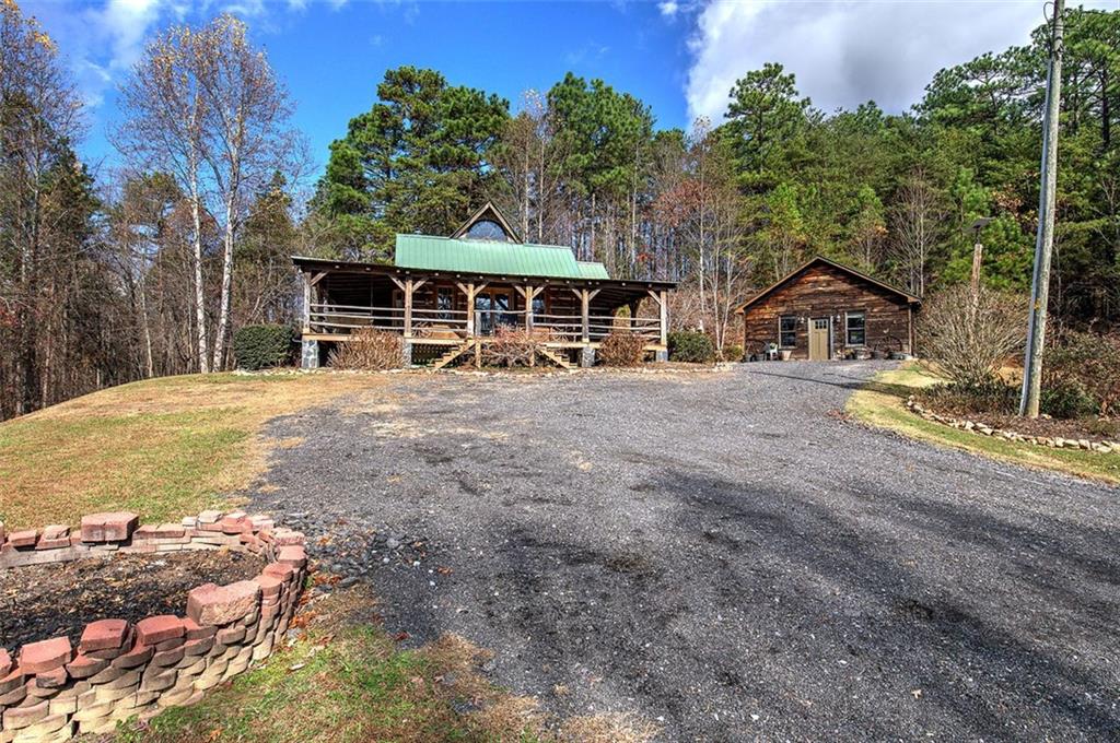 1252 Paris Mountain Road Rockmart, GA 30153 - Photo 41 of 93 a front view of a house with a yard