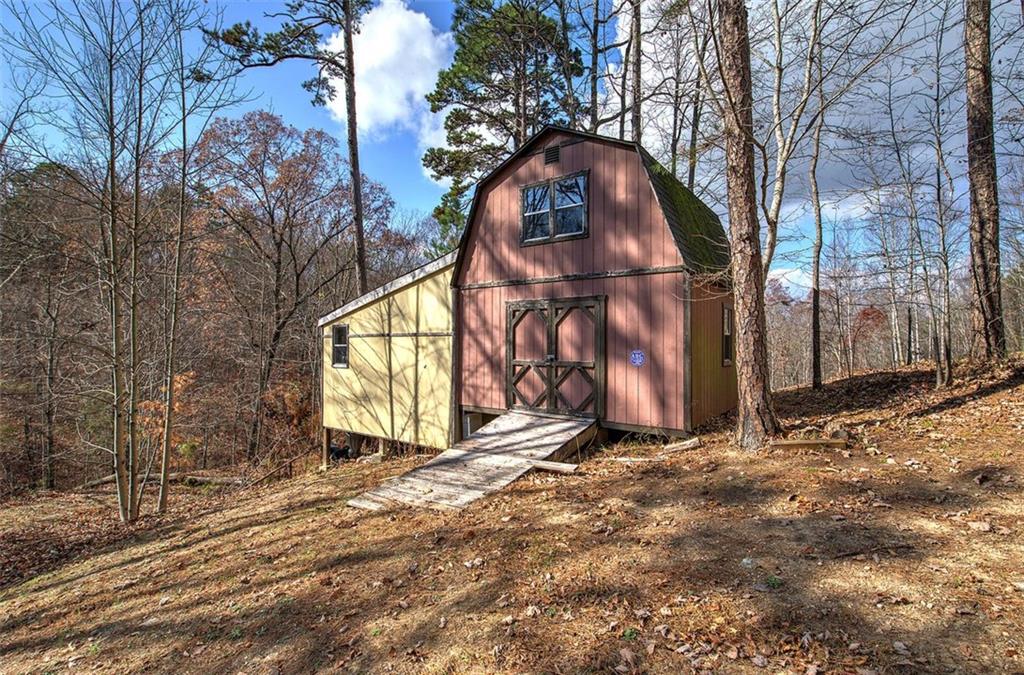 1252 Paris Mountain Road Rockmart, GA 30153 - Photo 51 of 93 a view of a house with a snow in the yard