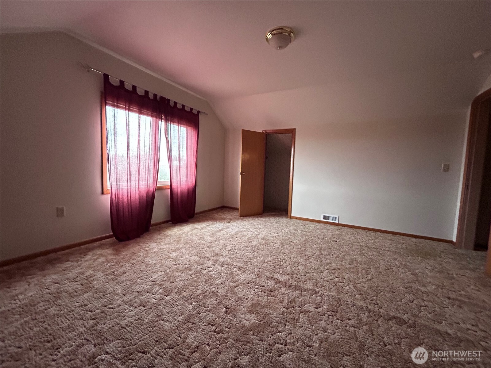 1925 Hampton Road Everson, WA 98247 - Photo 19 of 40 an empty room with windows and fireplace
