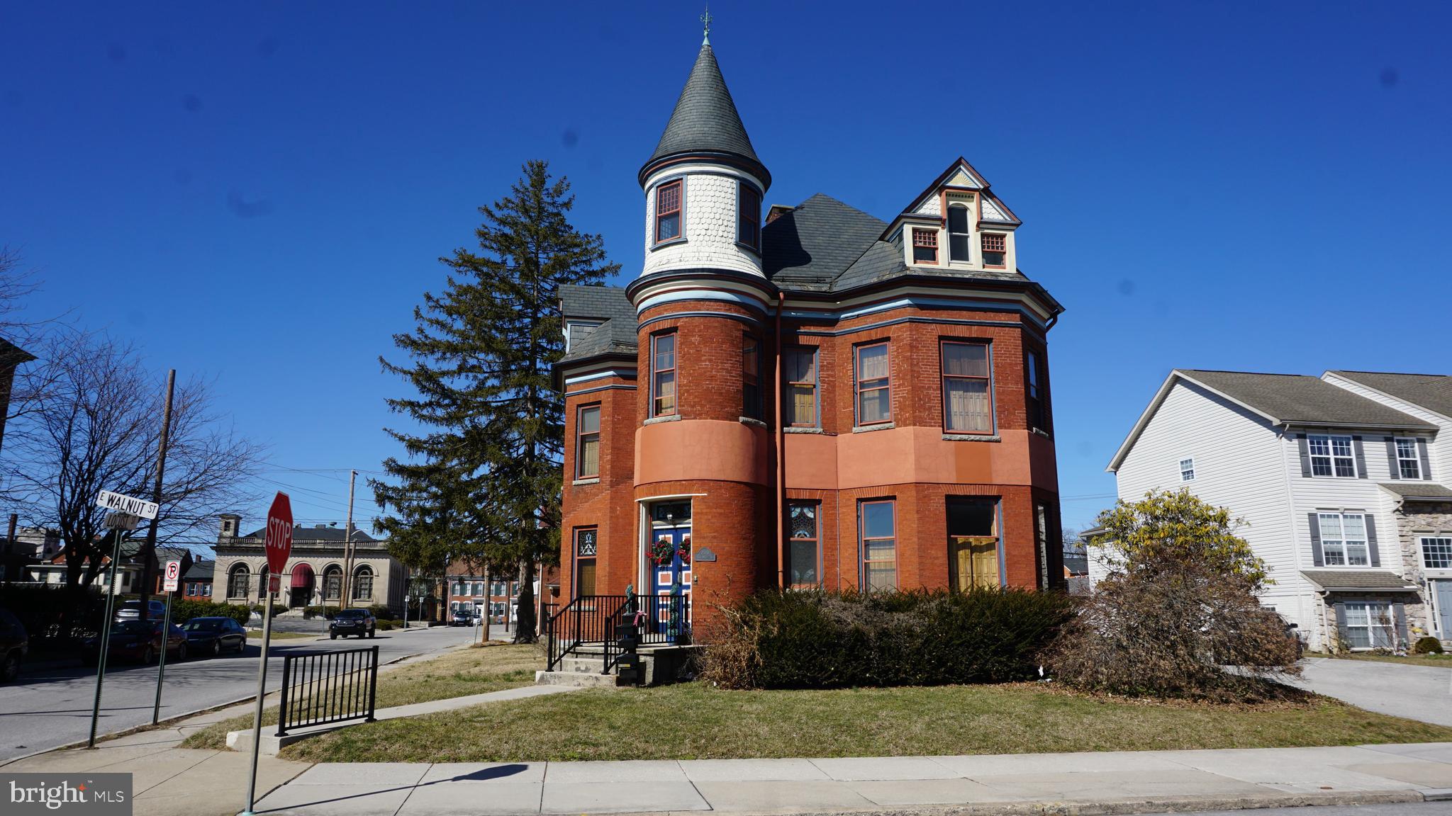 200 East Walnut Street, Unit 3 Hanover, PA 17331 - Photo 1 of 12 a front view of a house with garden