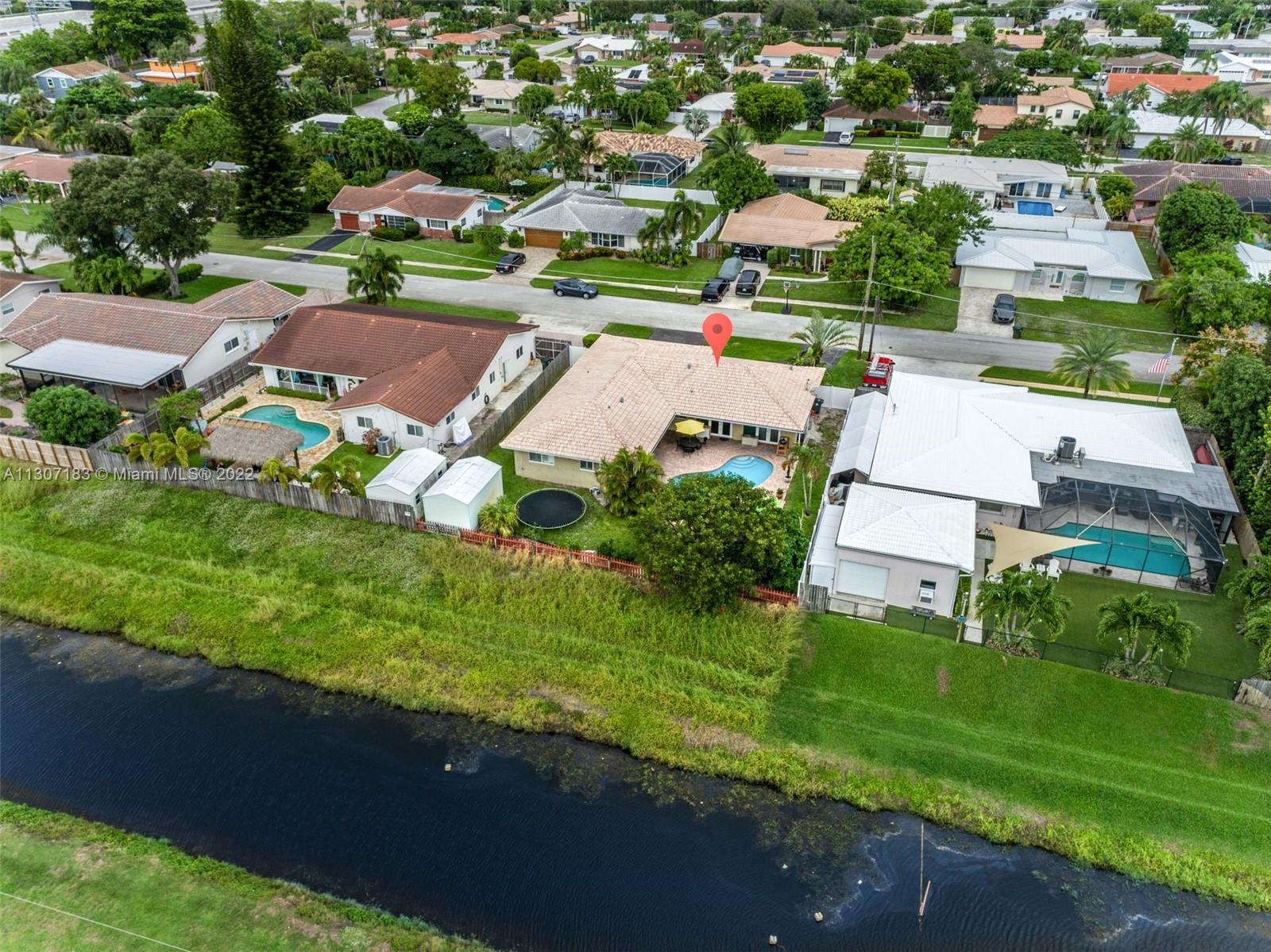 1592 Northwest 8th Street Boca Raton, FL 33486 - Photo 29 of 35 an aerial view of residential houses with outdoor space and street view