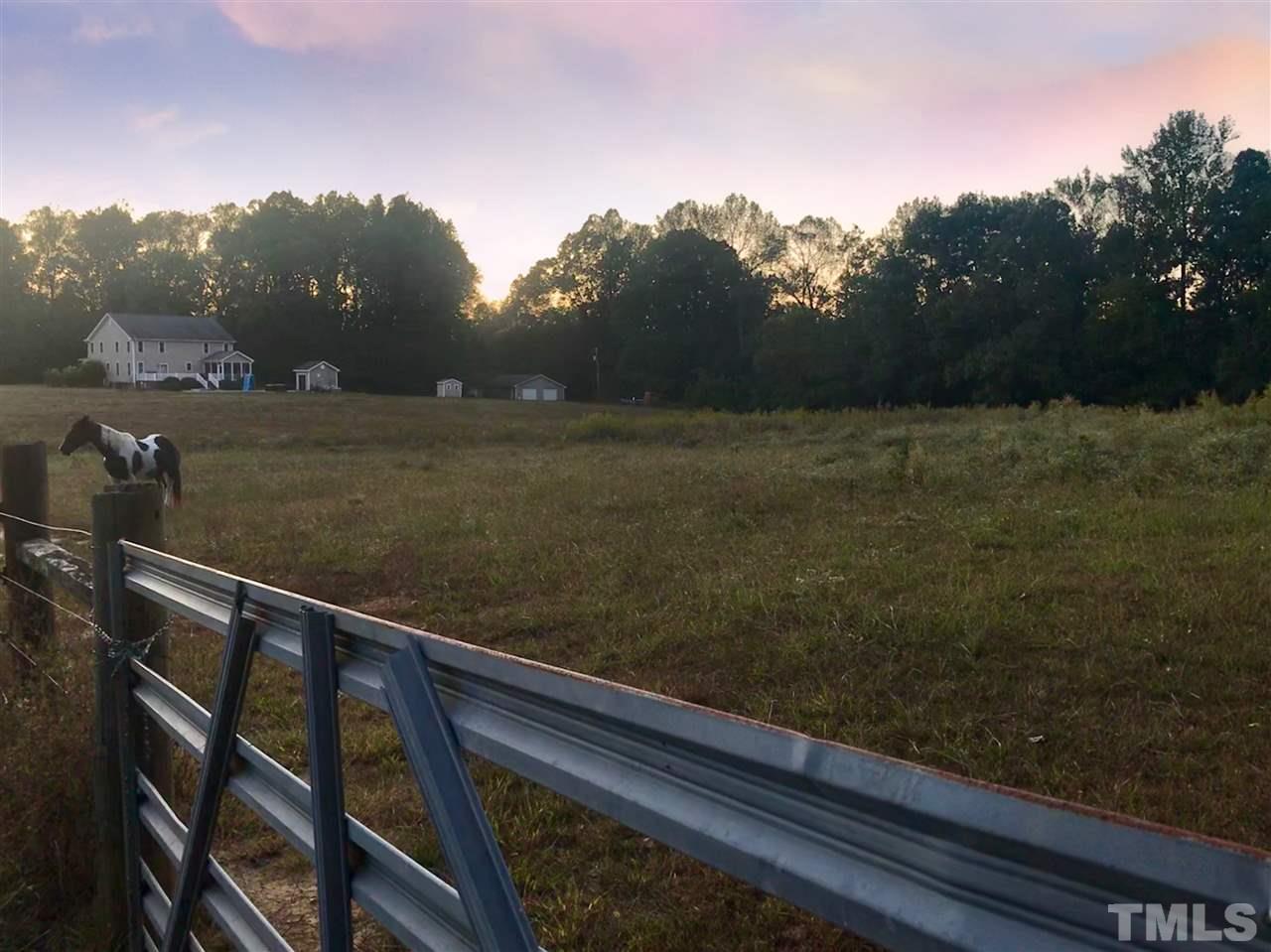 1316 Whitaker Road Mebane, NC 27302 - Photo 29 of 30 There are multiple pastures with a 1 stall barn/tack room and open fields.
