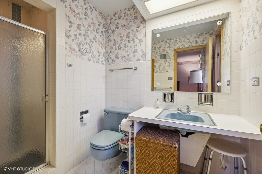 278 Longcommon Road Riverside, IL 60546 - Photo 19 of 36 a bathroom with a sink toilet and mirror