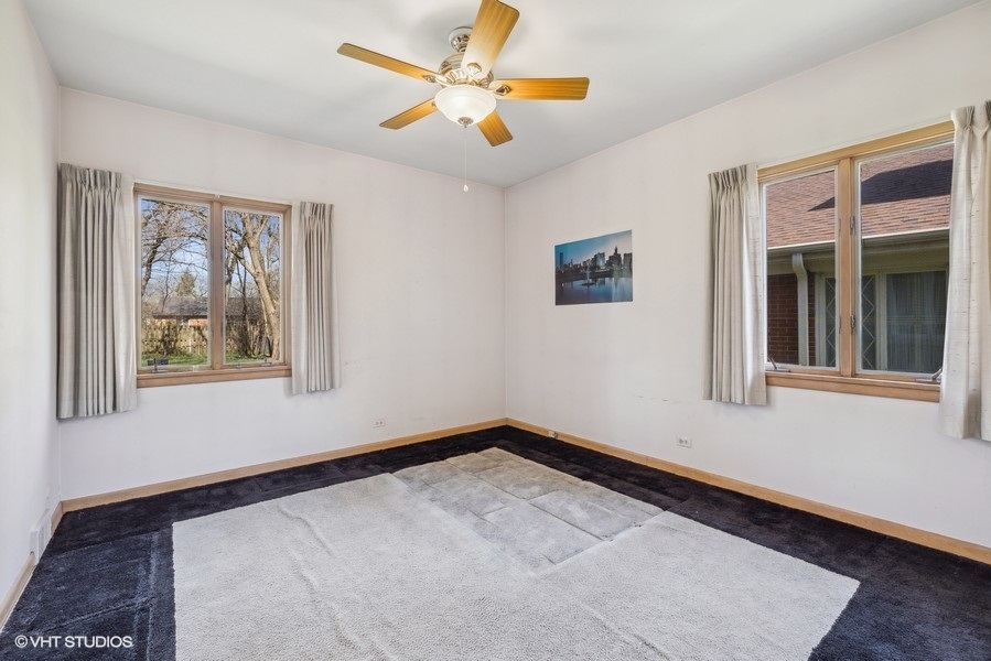 278 Longcommon Road Riverside, IL 60546 - Photo 20 of 36 a view of an empty room with a window